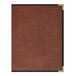 A brown leather H. Risch, Inc. tuxedo menu cover with black trim.