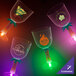 A close-up of a customizable plastic palm tree stem goblet with a green LED light.