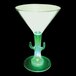 A green cactus shaped martini glass with a green LED light on the stem.