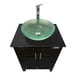 A Monsam portable sink with a frost glass bowl on a black counter.
