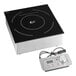 A black and silver Cooking Performance Group drop-in induction range with a black circle on it.