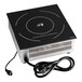 A black Cooking Performance Group drop-in induction range with a black cord.
