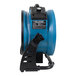 A close up of a blue and black XPOWER portable air circulator.