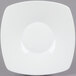 A white square porcelain plate with a rounded edge.