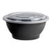 A black plastic bowl with a clear lid.