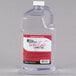 A Sterno jug of soft light liquid paraffin wax with a white cap.