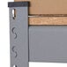 Interlake Mecalux grey heavy-duty boltless metal shelving with wooden panels.