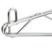 A close-up of a chrome Metro wall mount shelf clip.