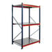 An Interlake Mecalux blue and orange steel shelving unit with steel decking.