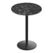 A black marble round table top on a black metal pole.