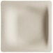 A white square World Centric compostable fiber plate with a shadow.