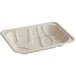 A white compostable fiber meat tray with a curved design.