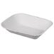 A Huhtamaki Chinet white molded fiber rectangular food tray with a white background.