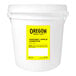 A white bucket of Oregon Harvest Apple Compote with a yellow label with black text.