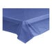 A navy blue plastic tablecloth on a table.