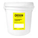 An Oregon Fruit Company white bucket with a yellow and black label.