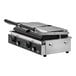 A Vollrath commercial double cast iron panini grill with a lid on a counter.