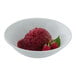 A bowl of Oregon Fruit raspberry puree on raspberry ice cream.