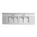 A Regency stainless steel underbar sink with four sinks, two faucets, and two drainboards.