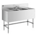 A Regency stainless steel underbar sink with (2) 12" drainboards and faucet.