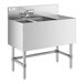 A Regency stainless steel underbar sink with two bowls and a faucet.