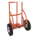 A close-up of a Wesco Industrial Products hand truck with black wheels.