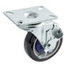 A black and metal Cooking Performance Group caster with a metal plate.