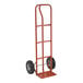 A red Wesco Economy Hand Truck with black pneumatic tires.
