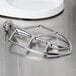 A Globe stainless steel flat beater attached to a mixer.