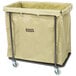 A tan canvas bag on a black metal Lavex Commercial laundry cart.