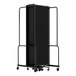 A National Public Seating black rectangular room divider with black metal frames on a cart.