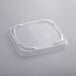 A stack of Pactiv clear plastic deli containers with lids.