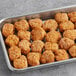 A tray of Beyond Meat Plant-Based Vegan Popcorn Chicken on a table.