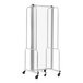 A gray metal cart with 3 clear acrylic panels on wheels.
