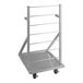 An Assure Parts mobile fryer basket rack with metal bars on wheels.