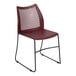 A Flash Furniture burgundy plastic banquet chair with black legs.