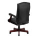 A Flash Furniture Martha Washington black office chair with wooden base.