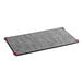 A gray and red Dyson activated carbon filter mat with red straps.