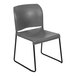 A gray plastic Flash Furniture stack chair with black legs.