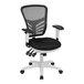 A black office chair with a white mesh back and white frame.