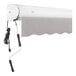 A grey Awntech Key West retractable patio awning with a protective hood.