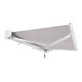 A grey Awntech Key West retractable patio awning with a white protective cover.