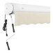 An Awntech Key West linen retractable patio awning with a protective hood over it.