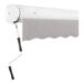 A white awning with a grey cloth on it.