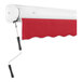A red Awntech Key West manual retractable patio awning with a protective hood.