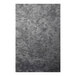 A close-up of a brushed metallic surface.