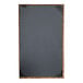A blackboard with wooden corners.