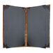A grey rectangular menu cover with a brown border and black and brown pages.