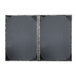 A close up of a H. Risch, Inc. brushed metallic steel menu cover with a black border.