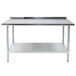 A stainless steel Advance Tabco work table with a shelf.